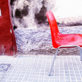 RED PLASTIC CHAIR